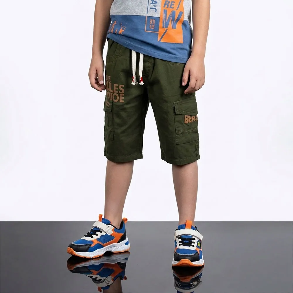شلوارک پسرانه کتان سبز مدل کمر کشی مناسب 9 تا 14 سال